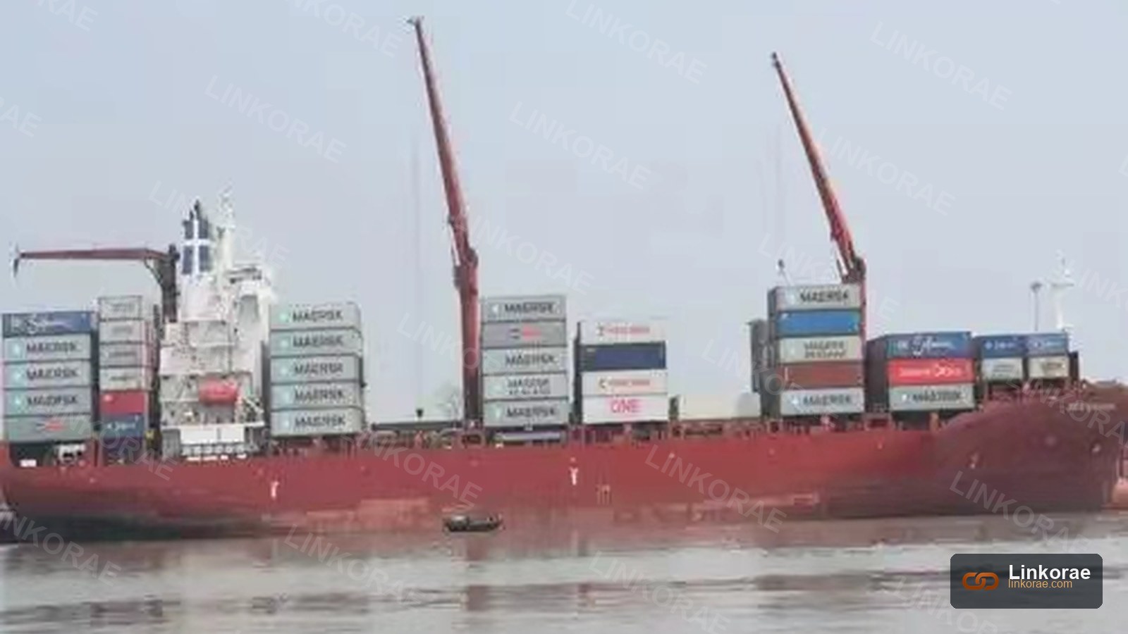 A geared container ship on the transpacific — ocean is slower, and that time has a cost