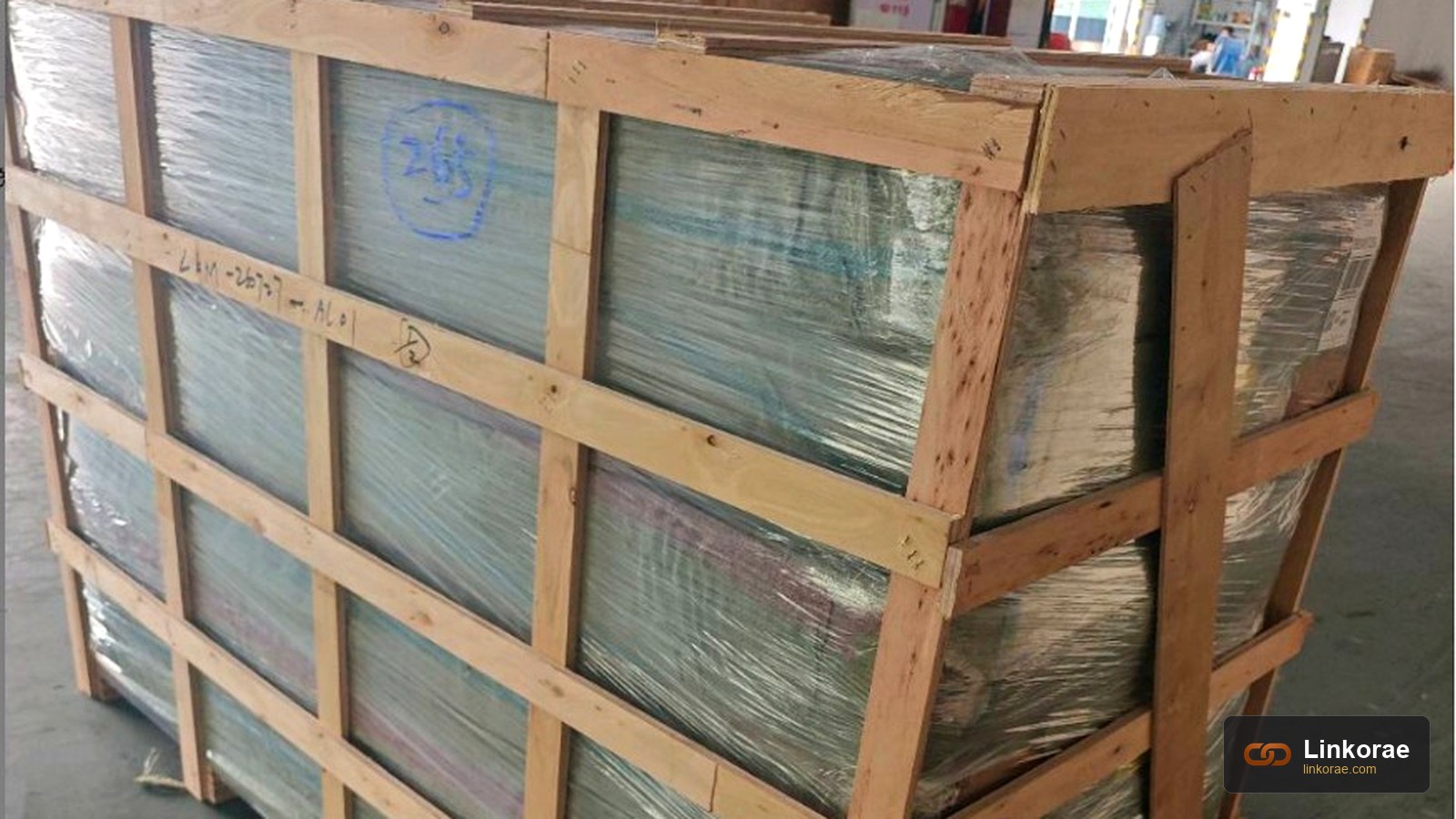 A stretch-wrapped crate on a warehouse floor — empty space inside the crate becomes chargeable kilos